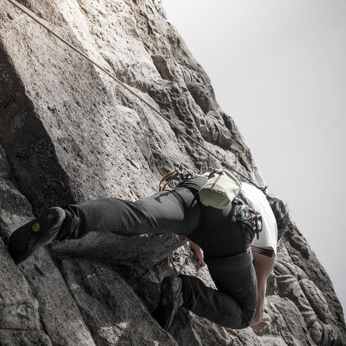 Woman rock climbing