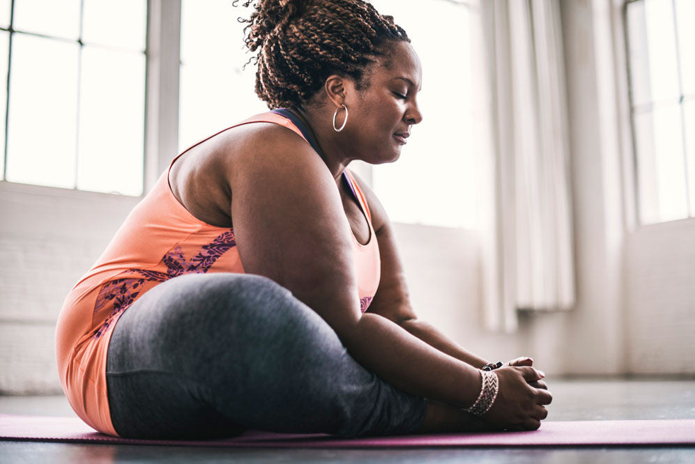 Woman in butterfly pose