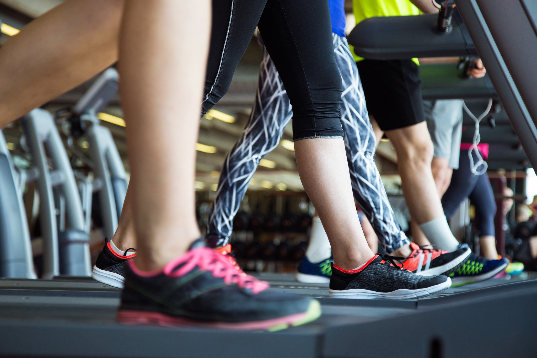 Group of people on treadmills 