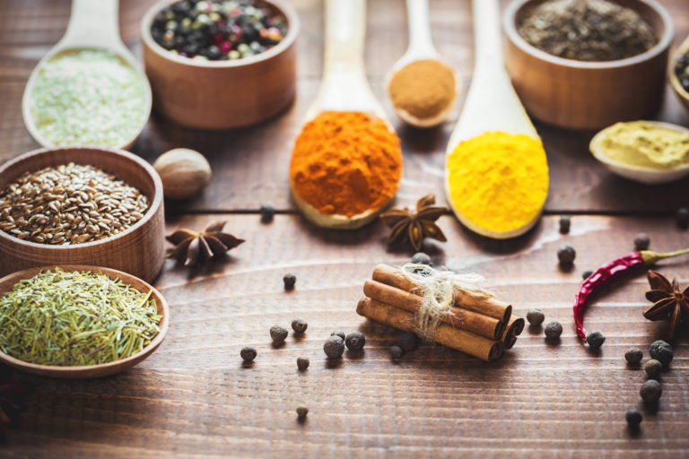 Bowls and spoons of herbs 
