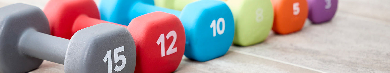 Row of colorful hand weights